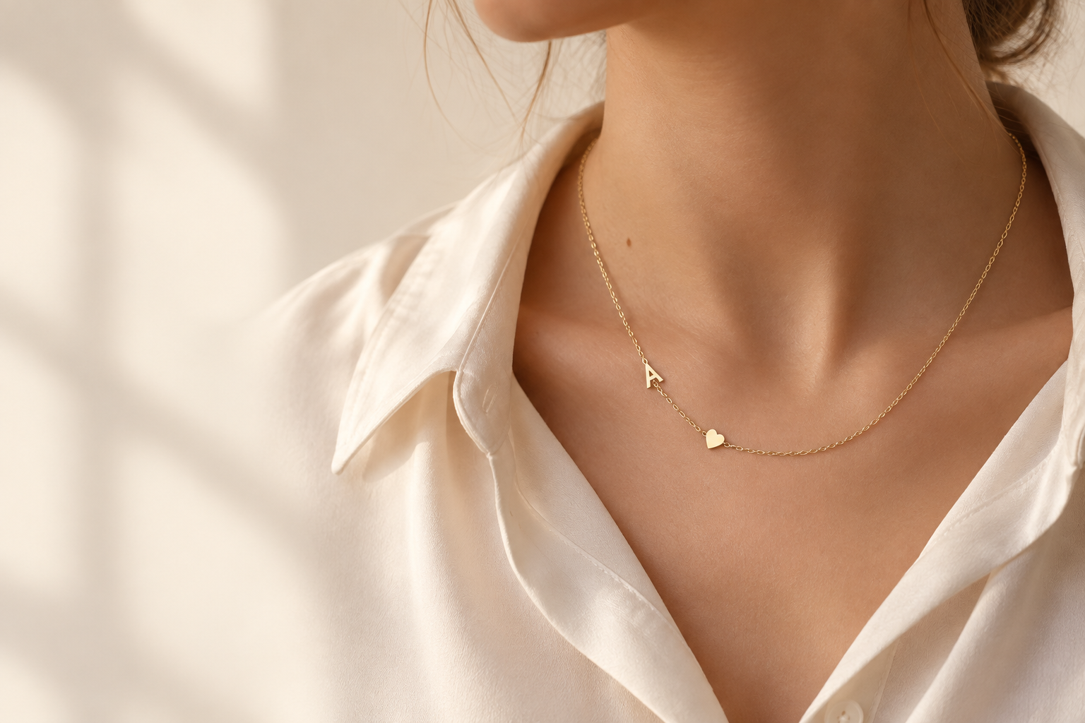 Gold coloured initial necklace